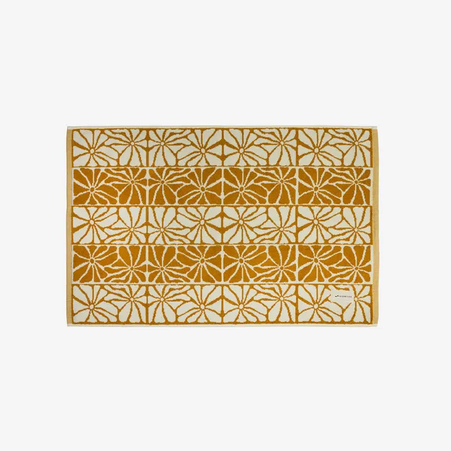 slowtide-ciao-zen-bath-mat-mustard-artist-collaboration image 1