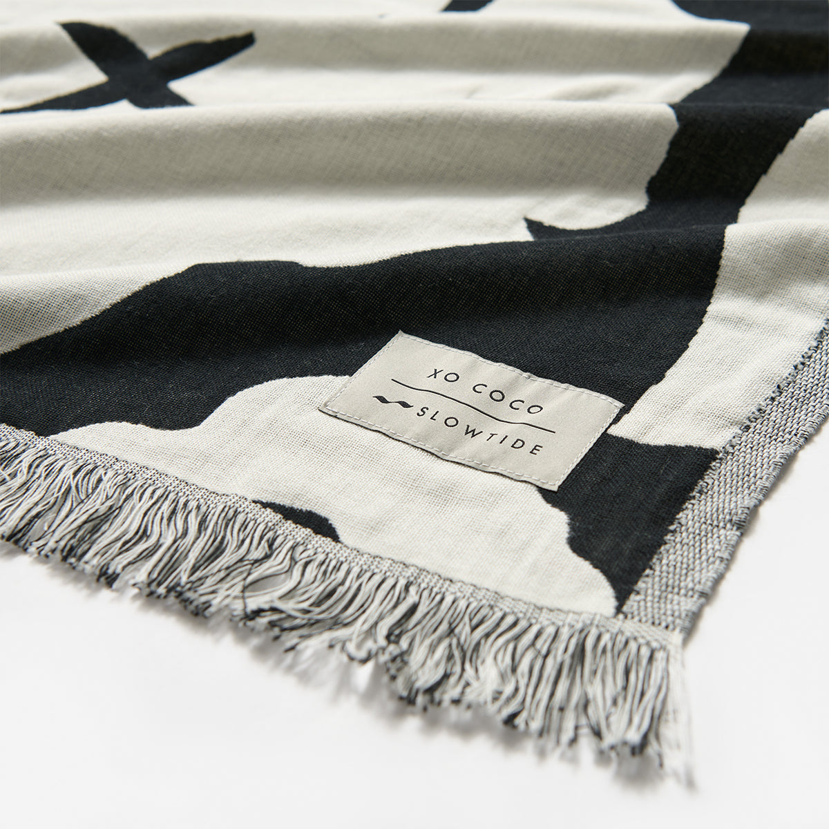 slowtide-xoxo-driftweave-beach-blanket-black-coco-ho-x-slowtide image 5